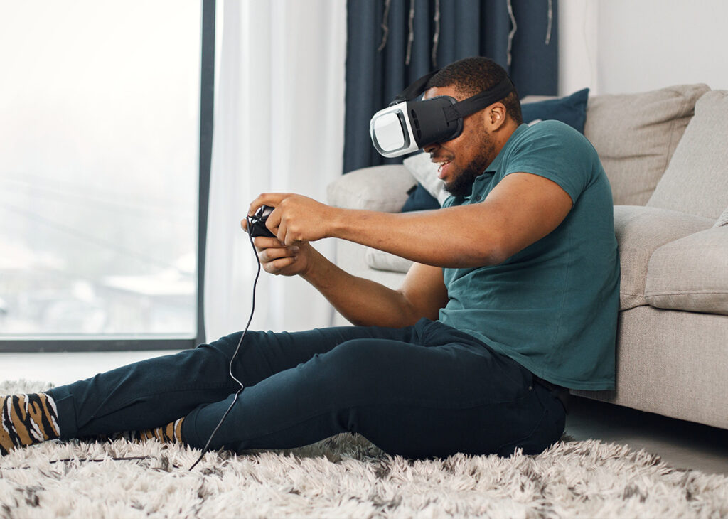 homem sedentario jogando video game